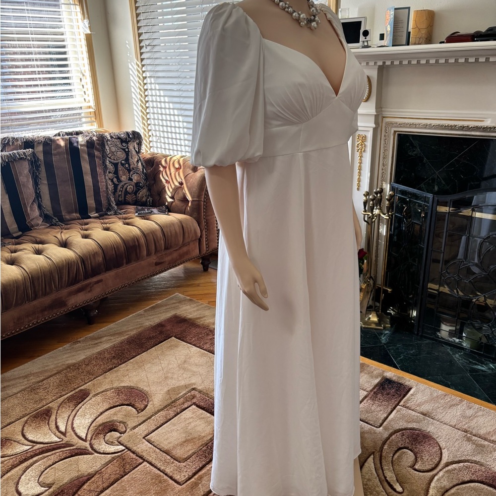 DB STUDIO
Bubble Sleeve Georgette V-Neck Wedding Dress
STYLE# SDWG0971. Size 16w - Picture 4 of 16